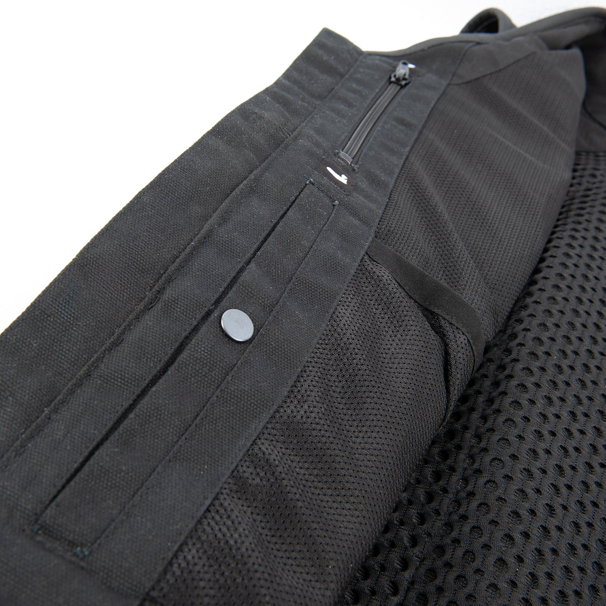 Black mesh vest interior on a white background